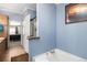 Primary bathroom features a soaking tub and walk-in shower at 16503 Barley Ave, Fort Lupton, CO 80621