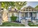 Charming home exterior with mature trees and manicured lawn, perfect for a Gathering at 575 N Marion St, Denver, CO 80218