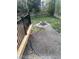 Serene backyard with a charming fire pit area, gravel, and a well-maintained lawn, ideal for outdoor entertaining at 10935 Acadia, Parker, CO 80138
