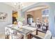 Open concept dining room table set for entertaining at 10935 Acadia, Parker, CO 80138