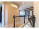 Bright upstairs hallway with natural light and views of home's built-ins at 10935 Acadia, Parker, CO 80138