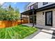 The backyard has a covered patio, offering a great space for relaxing at 357 S Franklin St, Denver, CO 80209