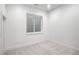 Basement bedroom featuring carpet floors and a window at 357 S Franklin St, Denver, CO 80209