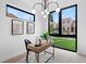Office featuring a modern desk, bright windows, and minimalist decor at 357 S Franklin St, Denver, CO 80209
