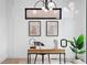 Office with modern lighting, large windows, and minimalist decor at 357 S Franklin St, Denver, CO 80209