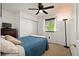 Bedroom with a sliding-door closet, window with blinds, carpeted floor, and a bright interior at 4360 S Braun Ct, Morrison, CO 80465