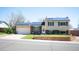 Charming two-story home with solar panels, well-maintained lawn and brick accents at 4360 S Braun Ct, Morrison, CO 80465