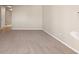 Spacious empty room with neutral carpet, fresh paint, and natural light streaming through the window at 8690 Allison St # H, Arvada, CO 80005