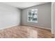 Bright bedroom featuring hardwood floors and natural light at 2575 S Syracuse Way # 101, Denver, CO 80231