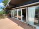 The patio has sliding glass doors looking into the living room providing seamless indoor/outdoor living at 29657 Loomis Way, Golden, CO 80403