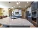 Modern kitchen featuring an oversized island, stainless steel appliances, and stylish two-tone cabinetry at 24661 E Layton Pl, Aurora, CO 80016