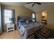 Large primary bedroom showcasing ensuite bathroom entrance and generous space at 24661 E Layton Pl, Aurora, CO 80016