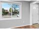 Living room with hardwood floors and view to the street at 316 Perry St, Denver, CO 80219