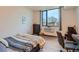 Cozy bedroom with large window and ample closet space at 603 Inca St # 213, Denver, CO 80204