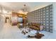 Stylish building lobby with leather seating, a patterned accent wall, and modern light fixture at 603 Inca St # 213, Denver, CO 80204