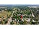 An aerial view of a tranquil residential area showcasing single Gathering homes, mature trees, and a peaceful neighborhood setting at 6427 S Ingalls St, Littleton, CO 80123