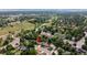 Aerial view highlights the neighborhood's peaceful streets, mature trees, manicured lawns and close proximity to natural landscape at 6427 S Ingalls St, Littleton, CO 80123