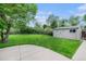 Backyard featuring a lawn, shed and patio at 6427 S Ingalls St, Littleton, CO 80123