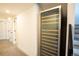 Hallway features a wine fridge for storing beverages at 3600 N Pecos St, Denver, CO 80211