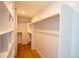 Spacious walk-in closet with custom shelving and ample storage space for clothing and accessories at 3600 N Pecos St, Denver, CO 80211