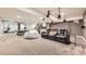 Finished basement area with theater seating, ping pong, and exercise equipment at 6063 Eldora St, Golden, CO 80403