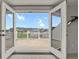 View from the balcony showing the neighborhood and distant mountains at 9353 Middle Fork St, Littleton, CO 80125