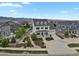 Two-story home featuring a charming front porch, landscaped yard and mountain views at 9353 Middle Fork St, Littleton, CO 80125
