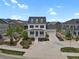 Beautiful two-story home showcasing the landscaped front yard and neighborhood at 9353 Middle Fork St, Littleton, CO 80125