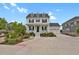 Charming two-story home with a welcoming front porch and well-manicured landscaping at 9353 Middle Fork St, Littleton, CO 80125