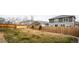 Large backyard with grassy area and wood fence at 7924 Florado St, Denver, CO 80221