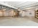 Unfinished basement offering ample space for storage or customization at 5226 Inland Ave, Firestone, CO 80504