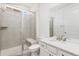Modern bathroom featuring a glass enclosed shower, and sleek vanity at 5226 Inland Ave, Firestone, CO 80504