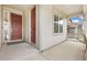 Inviting front porch with a cozy space to relax and enjoy the neighborhood views at 5226 Inland Ave, Firestone, CO 80504