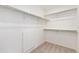 Spacious walk-in closet with shelving provides ample storage space at 5226 Inland Ave, Firestone, CO 80504