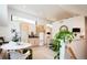 Open living area with breakfast nook, cabinetry, and natural light at 13905 Berry Rd, Golden, CO 80401