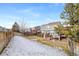 Spacious backyard with deck and partially covered patio at 3836 Garnet Way, Highlands Ranch, CO 80126