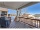 Back deck with built-in grill and views of the neighborhood at 7938 S Quemoy Way, Aurora, CO 80016