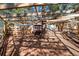 Backyard featuring a covered outdoor enclosure with a wooden frame at 4185 Red Rock Dr, Larkspur, CO 80118