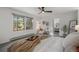 Bright bedroom with a large window, plush carpet, and a comfortable chair for relaxing at 4185 Red Rock Dr, Larkspur, CO 80118