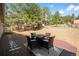 Wood deck featuring an outdoor table and chairs at 4185 Red Rock Dr, Larkspur, CO 80118