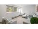 Cozy living room area with natural light and comfortable seating at 4185 Red Rock Dr, Larkspur, CO 80118