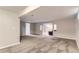 Large, finished basement boasts neutral carpet, recessed lighting and an open floor plan at 925 Wolff St, Denver, CO 80204