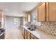 Spacious kitchen with an open layout, stainless steel appliances, and ample counter space at 925 Wolff St, Denver, CO 80204