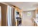 Modern kitchen featuring stainless steel appliances and an abundance of cabinets at 925 Wolff St, Denver, CO 80204