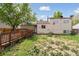 Backyard featuring deck and landscaping at 19053 E 22Nd Dr, Aurora, CO 80011