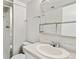 A clean bathroom with a shower and a vanity with modern chrome fixtures at 19053 E 22Nd Dr, Aurora, CO 80011
