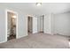 A bright bedroom with attached bathroom and double closet at 19053 E 22Nd Dr, Aurora, CO 80011