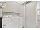 A well-equipped laundry area with modern washer and dryer units at 19053 E 22Nd Dr, Aurora, CO 80011