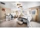 Spacious bedroom featuring comfortable seating and large windows at 814 Pintail Ave, Brighton, CO 80601