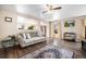 Cozy living room with hardwood floors, comfortable sofas, and neutral color scheme at 814 Pintail Ave, Brighton, CO 80601